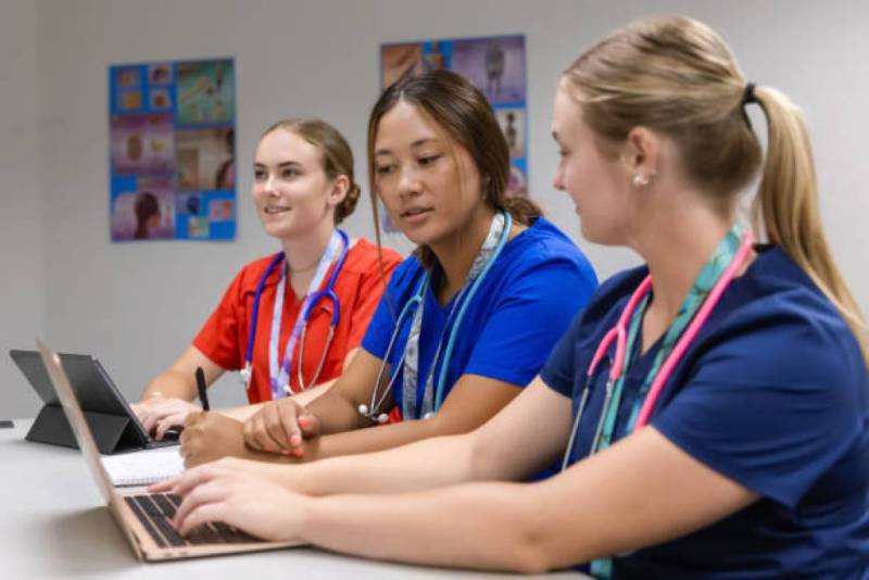 Young women attending a nurse aide training session. 