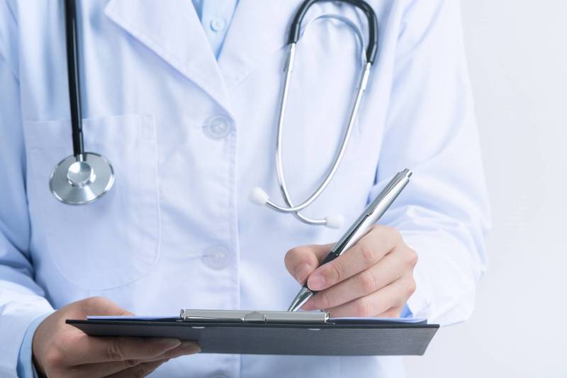 Provider with a clipboard and pen