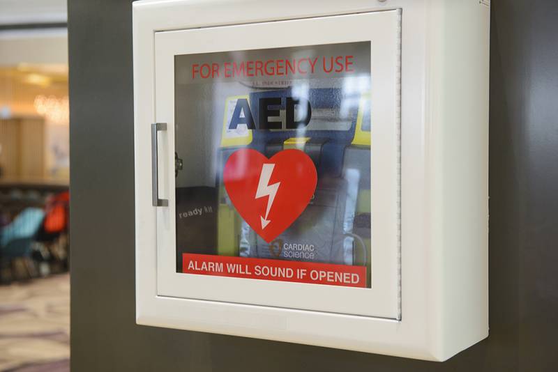 Automated External Defibrillator (AED) mounted on a wall