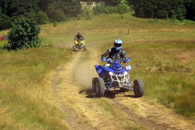 person riding an ​​​​​​​ATV