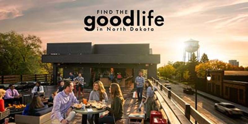 Young people dining out on a rooftop restaurant