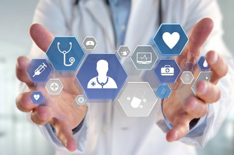 Icons (Syringe, stethoscope, person, heart, pill) of syringe service components in between two hands