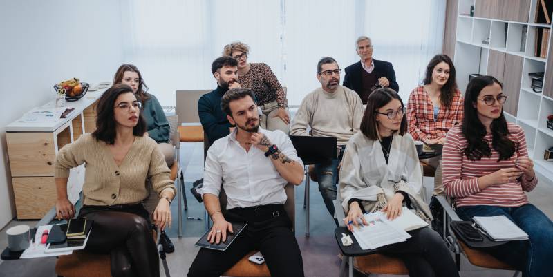 Group of people in training for work