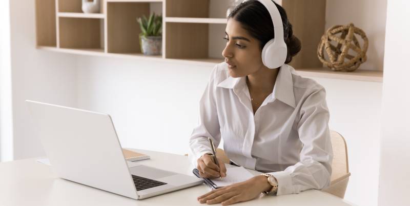 Woman working at a computer