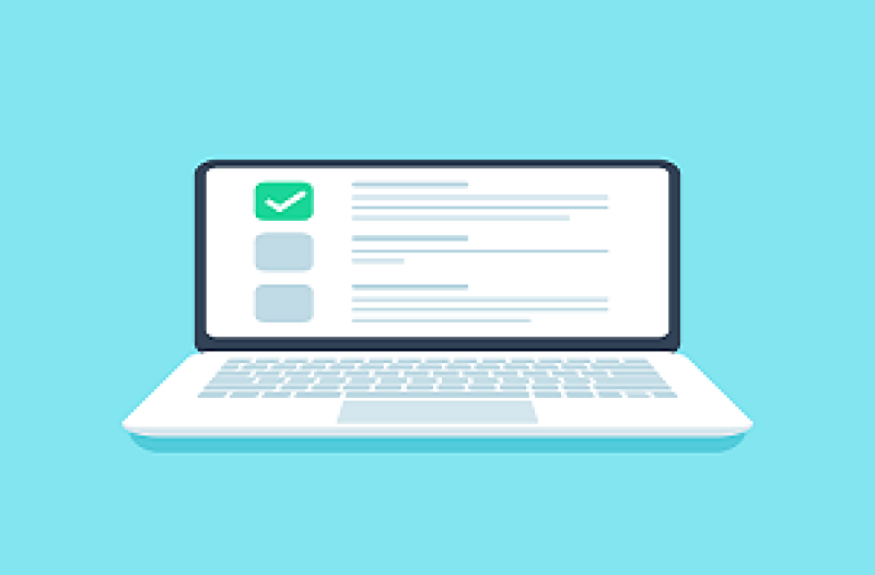 Computer with check mark on screen