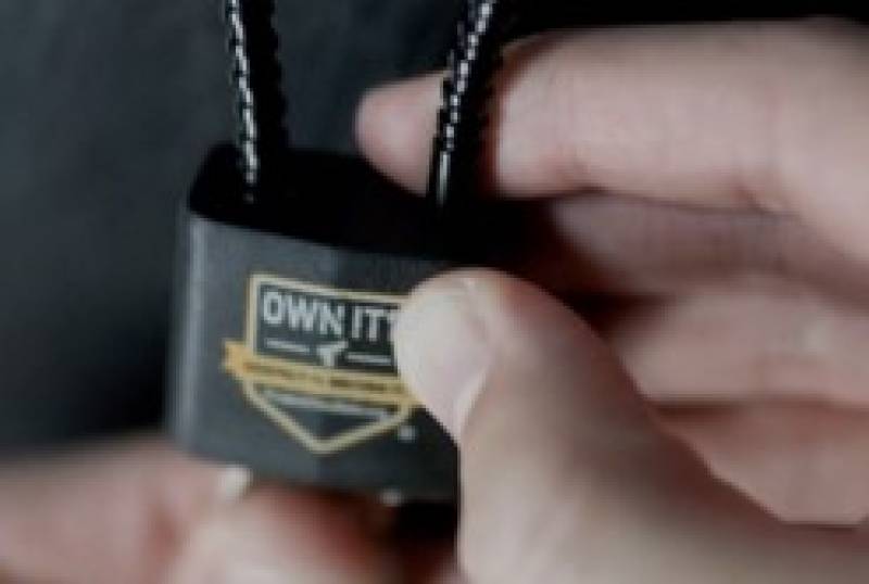 hand with firearm safety lock