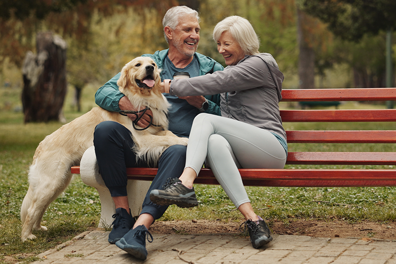 mature couple with dog