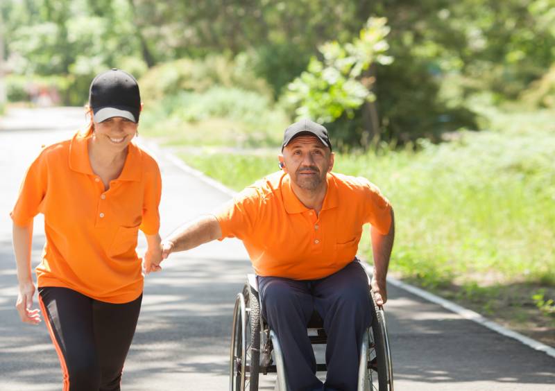 a partner race involving one participant in a wheelchair