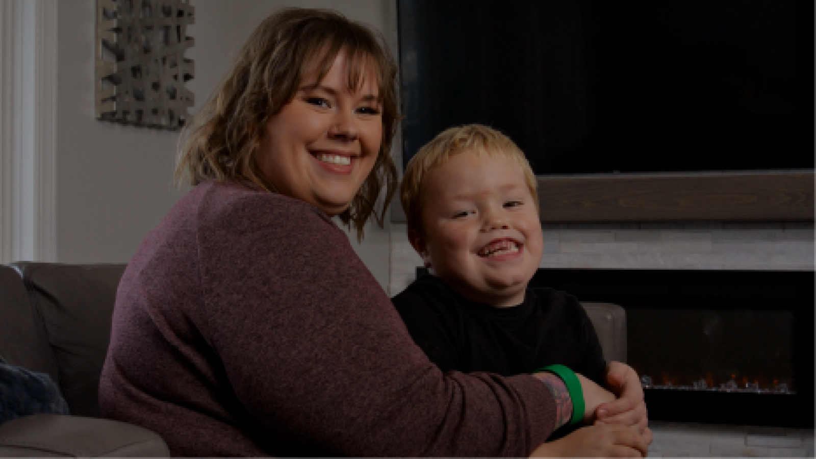 Mother and son smiling