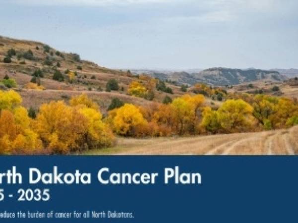 Cover of the ND Cancer Plan 2025-2035 showing hillside in the North Dakota badlands in fall colors