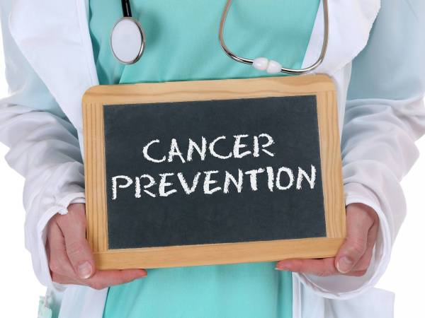 Blackboard sign stating cancer prevention