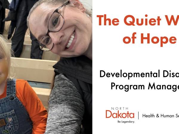Photo of a developmental disability program manager with a child and the title "The Quiet Work of Hope"