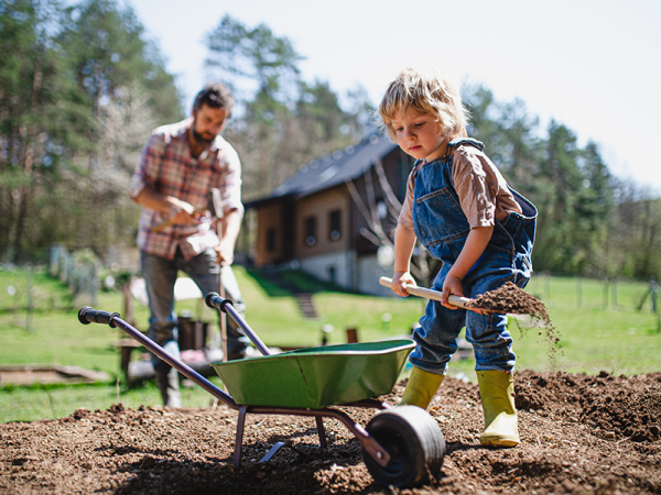 Father and son doing yardwork
