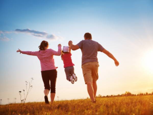 happy family in a field