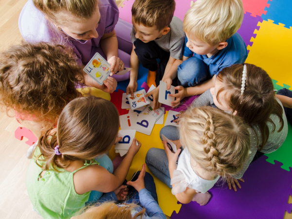 Picture of children learning in a classroom.