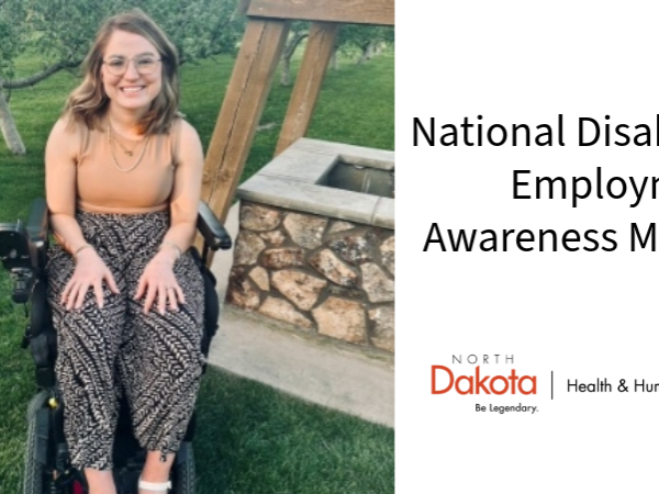 Allissa Patterson sitting in wheelchair outside