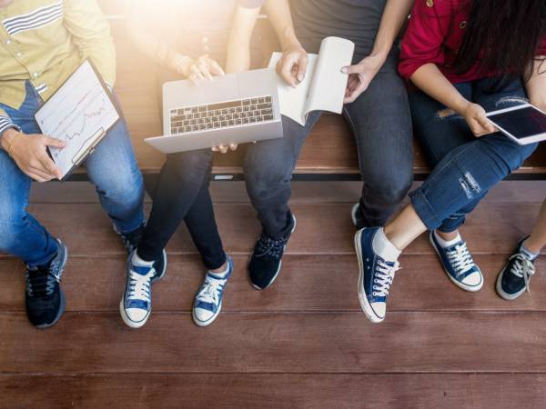 Teens on laptops