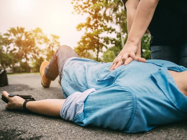 A person receives CPR