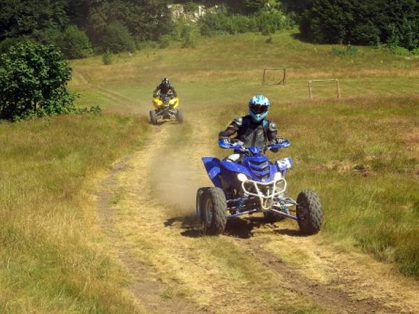 person riding an ​​​​​​​ATV