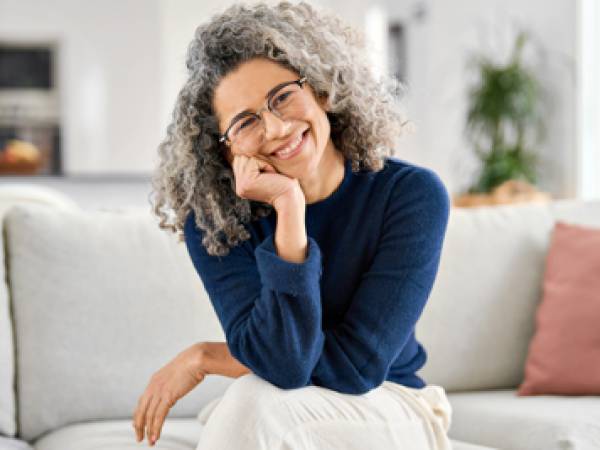 woman sitting on couch