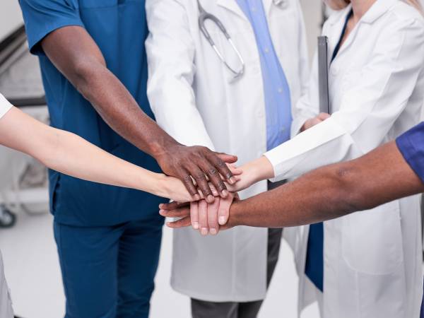 health professionals showing team work