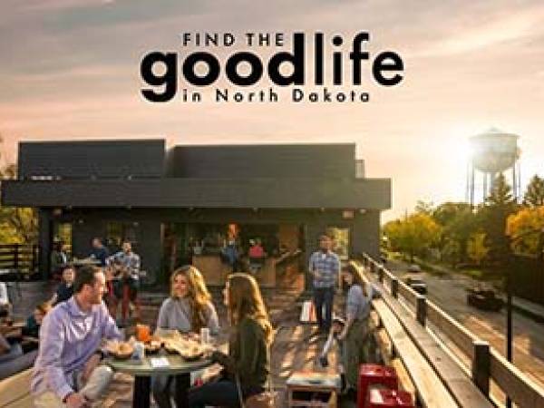 Young people dining out on a rooftop restaurant