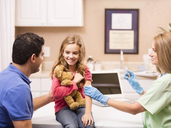 Little girl getting a vaccine