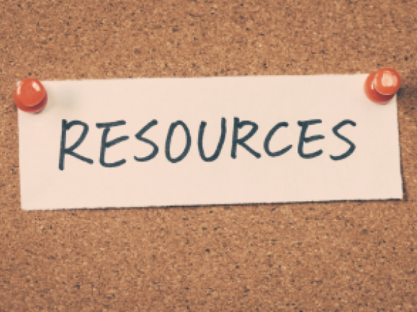 Bulletin board with note saying resources