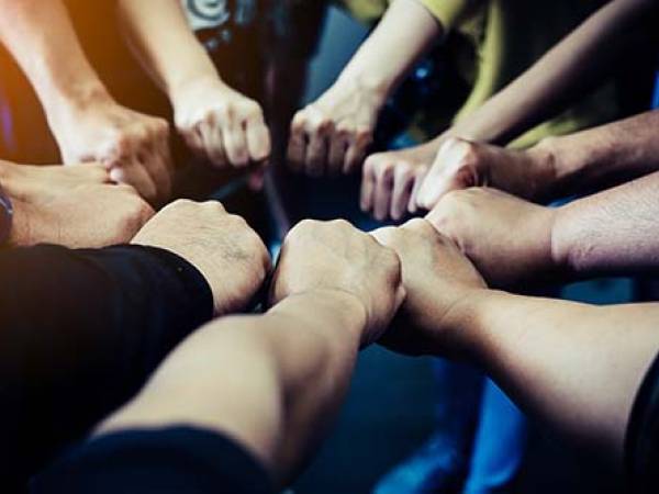 fists in circle