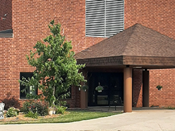 Front Entrance Maplewood Residential Building brown brick exterior