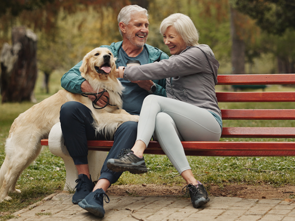 mature couple with dog