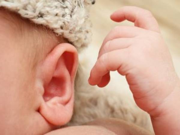 newborn in a hat