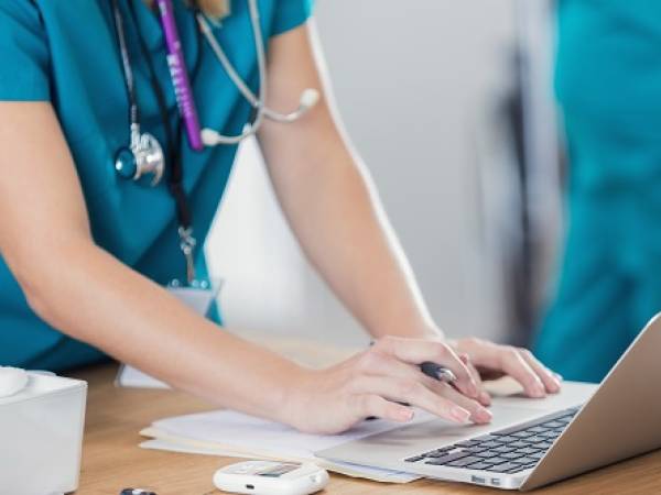 Nurse using computer