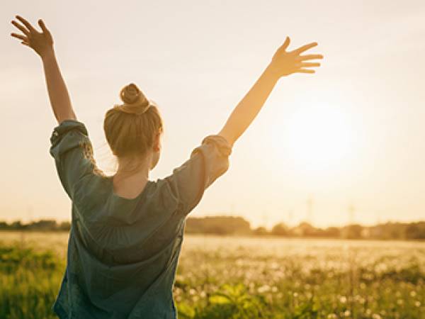 Woman holding hands in the air