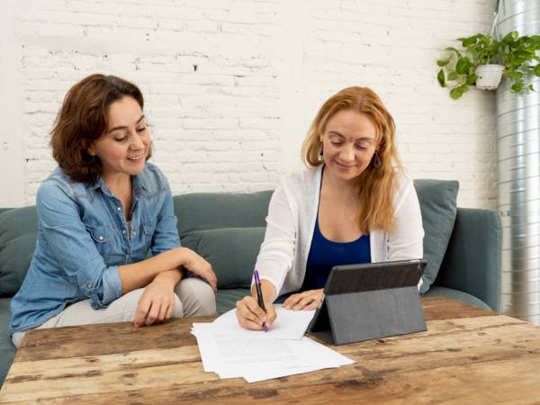Two females working