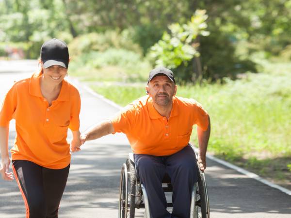 a partner race involving one participant in a wheelchair