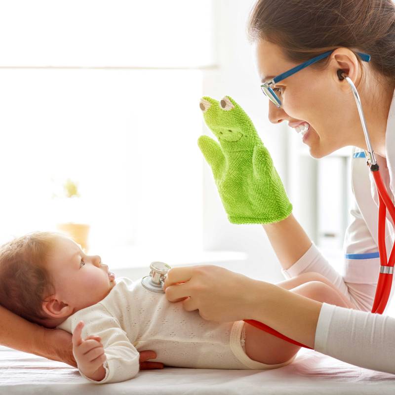 Physician Examining Baby