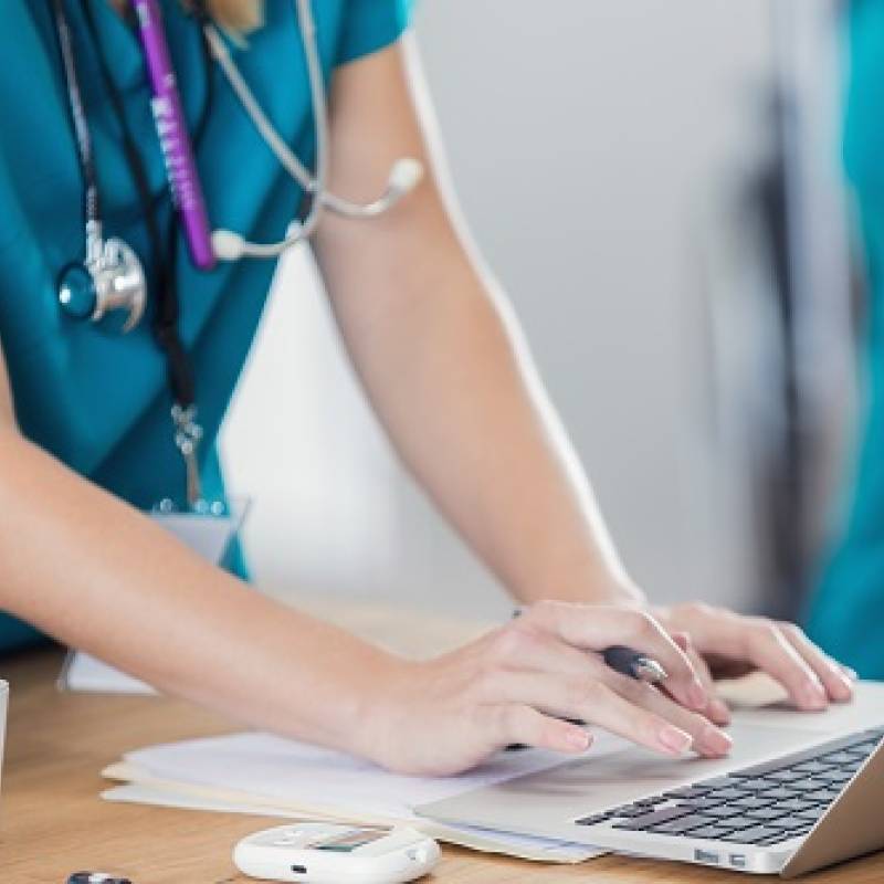 Nurse using computer