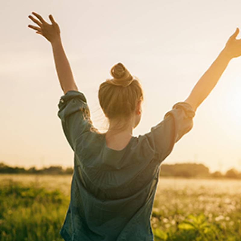Woman holding hands in the air