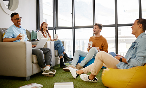 Creative, studying and students meeting for project collaboration, teamwork or research planning in university workspace.