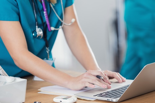 Nurse using computer