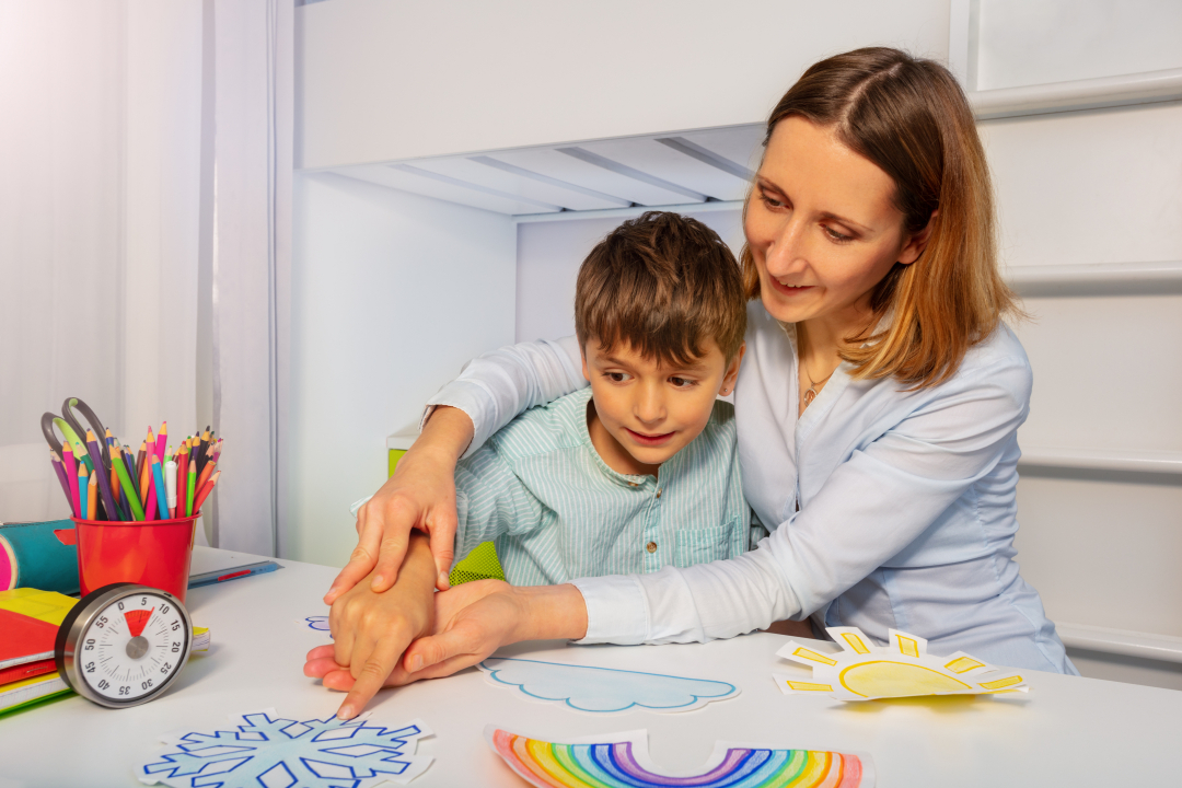 teacher with young child