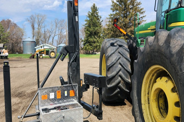 John Deere tractor with portable lift.