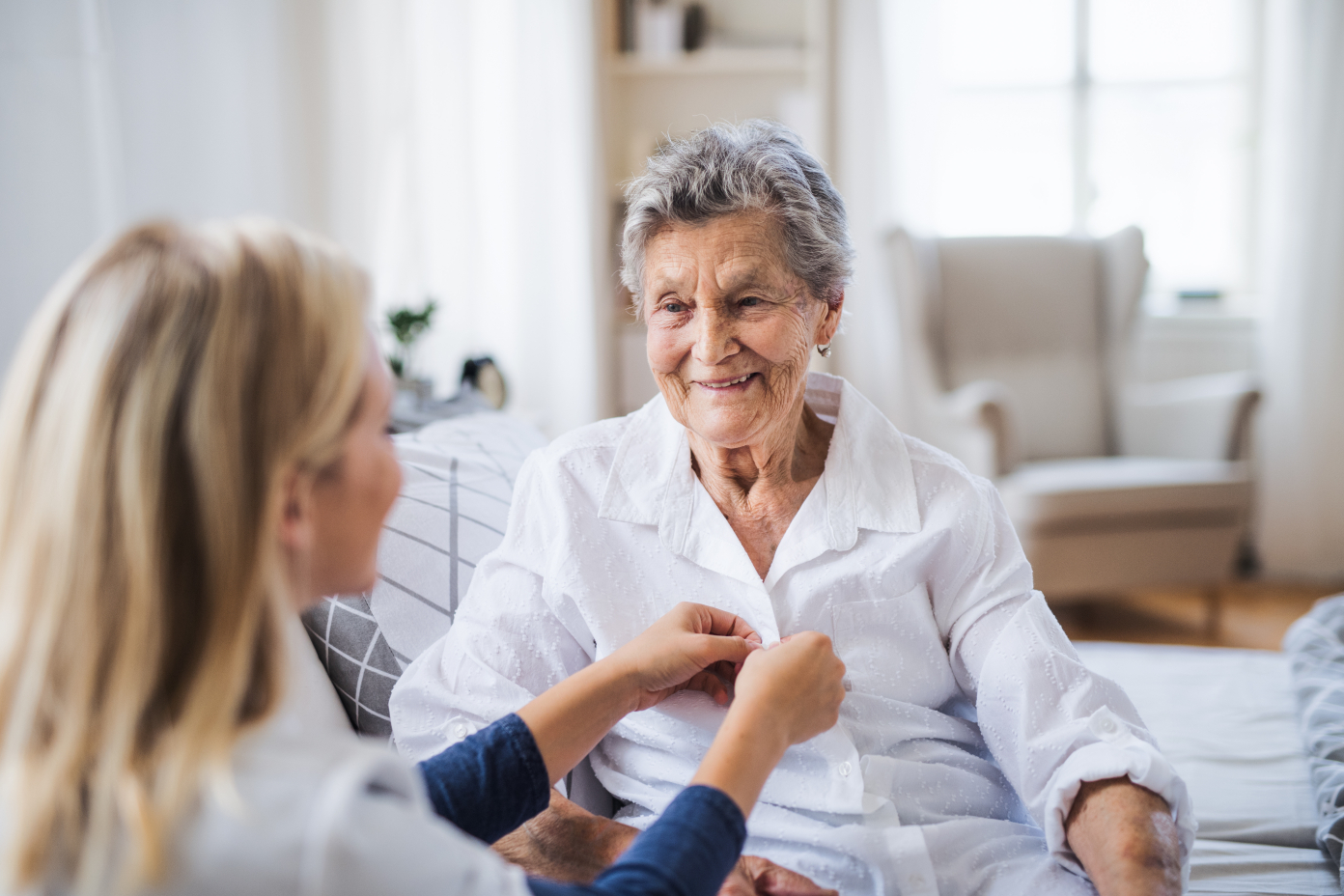 Caregiver assisting elderly