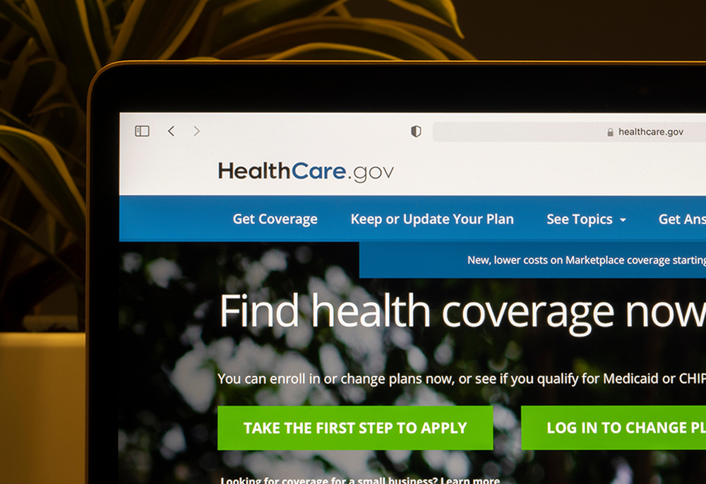 The homepage of HealthCare.gov, a health insurance exchange website operated under the United States federal government, is seen on a laptop computer