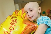 Smiling girl with a balloon