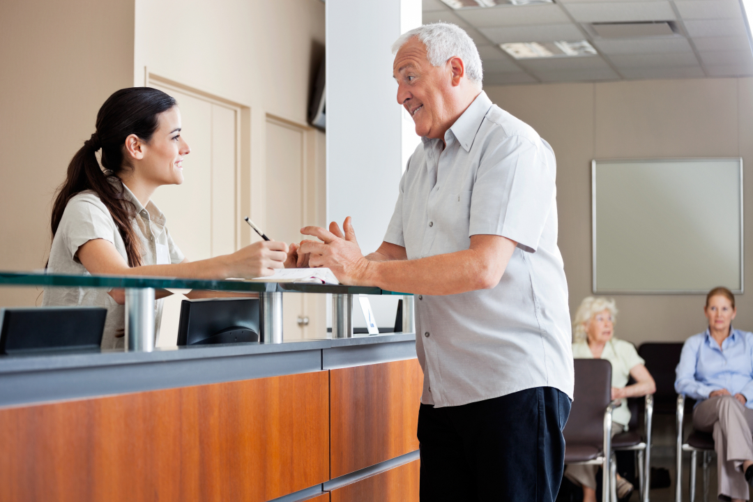 Man at reception clinic