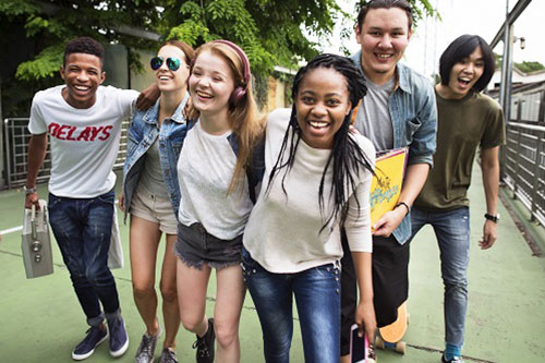 Group of smiling teenagers