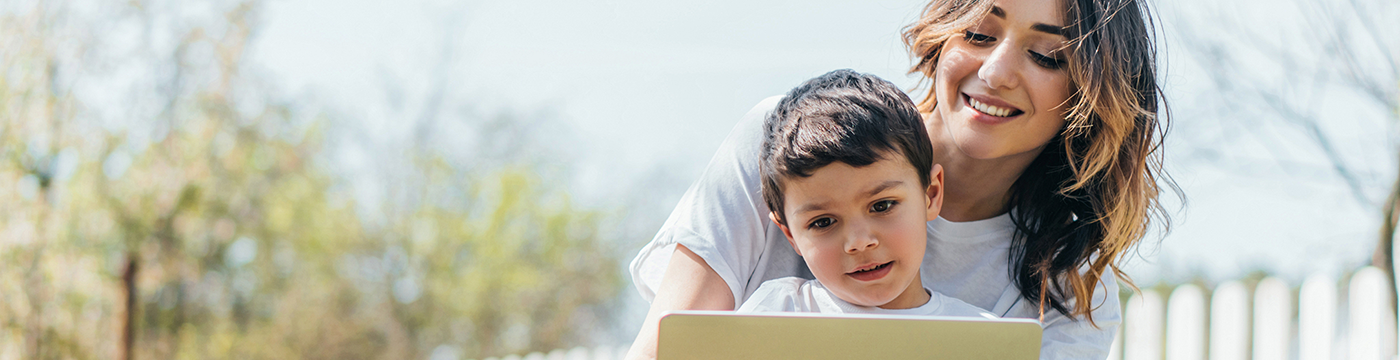 Mother and son using a laptop