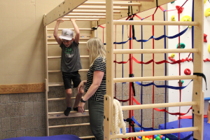 Child on exercise equipment